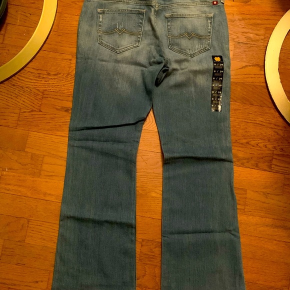 Lucky Brand Neopolitan sweet n low. Mid rise easy fit slight flare. - Picture 4 of 8